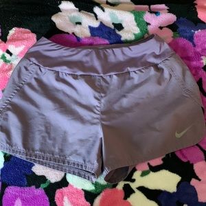 Purple Nike running shorts